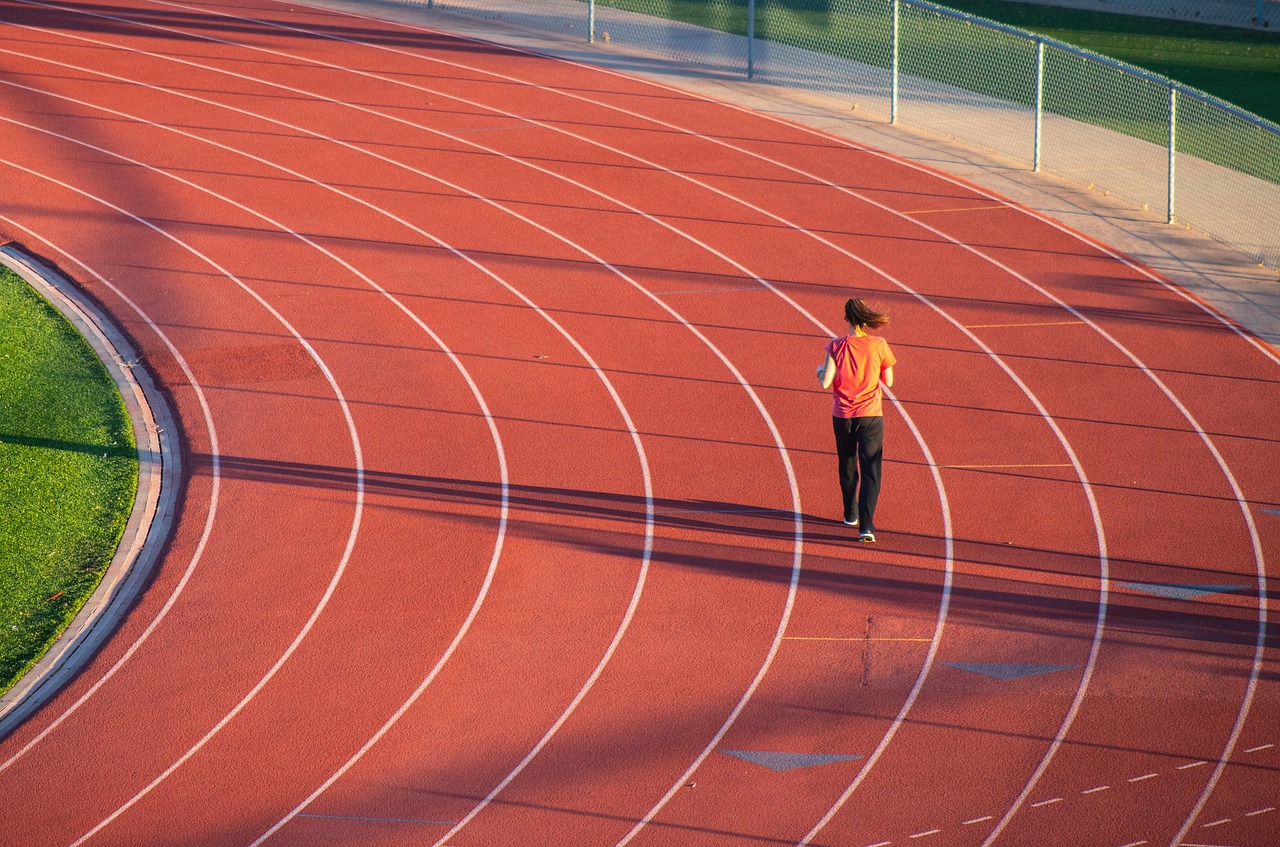 Running, woman, track — 6 Common Medical Marijuana Mistakes to Avoid for New Users