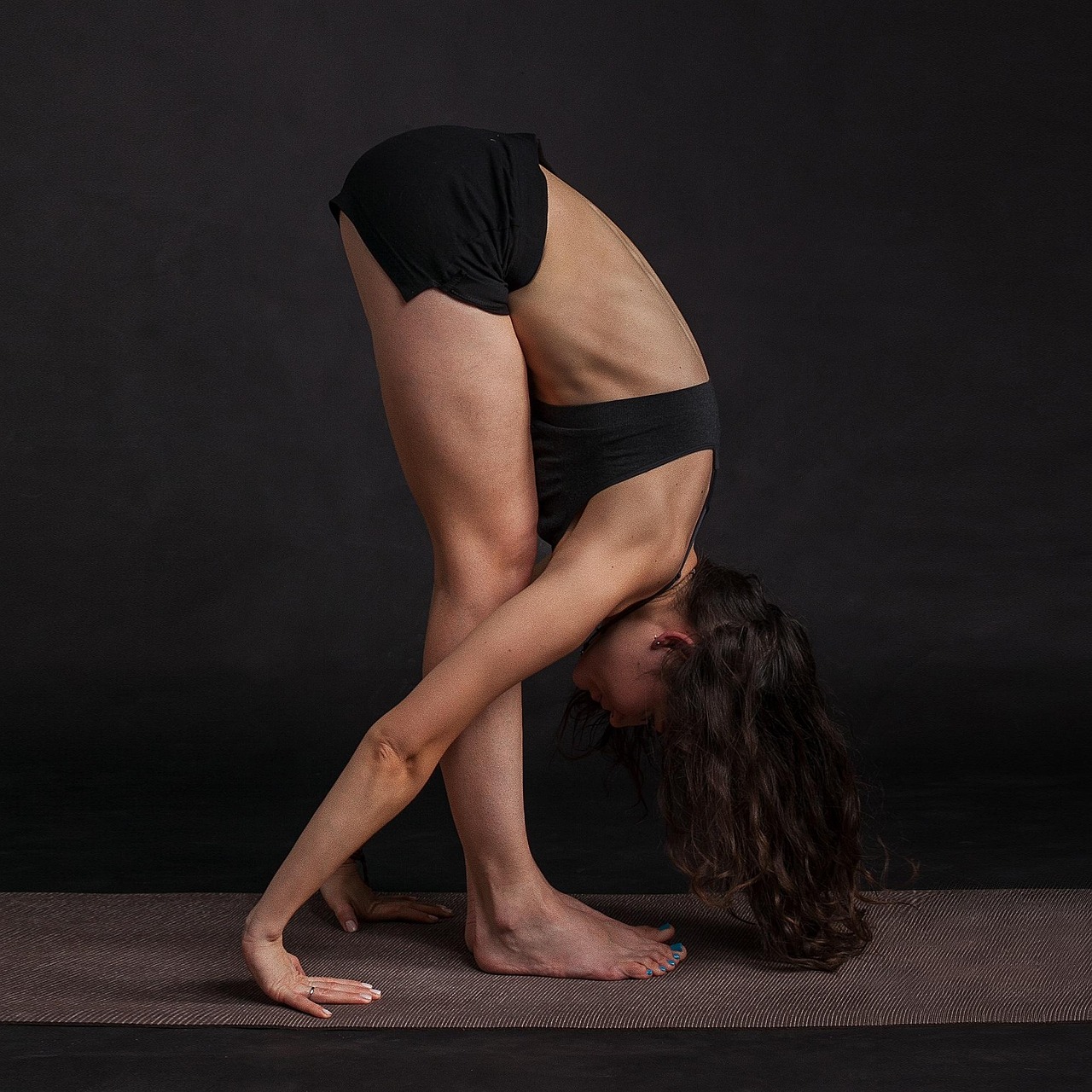 Woman, body, stretching — Five benefits of meditation for college students