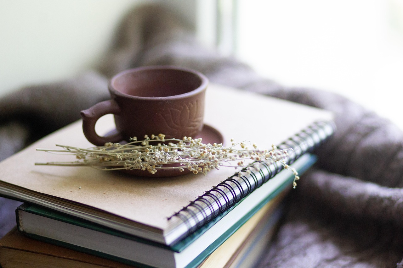 Books, cup, herbs — How to Get an Ideal Olympic Body with Home Fitness Equipment