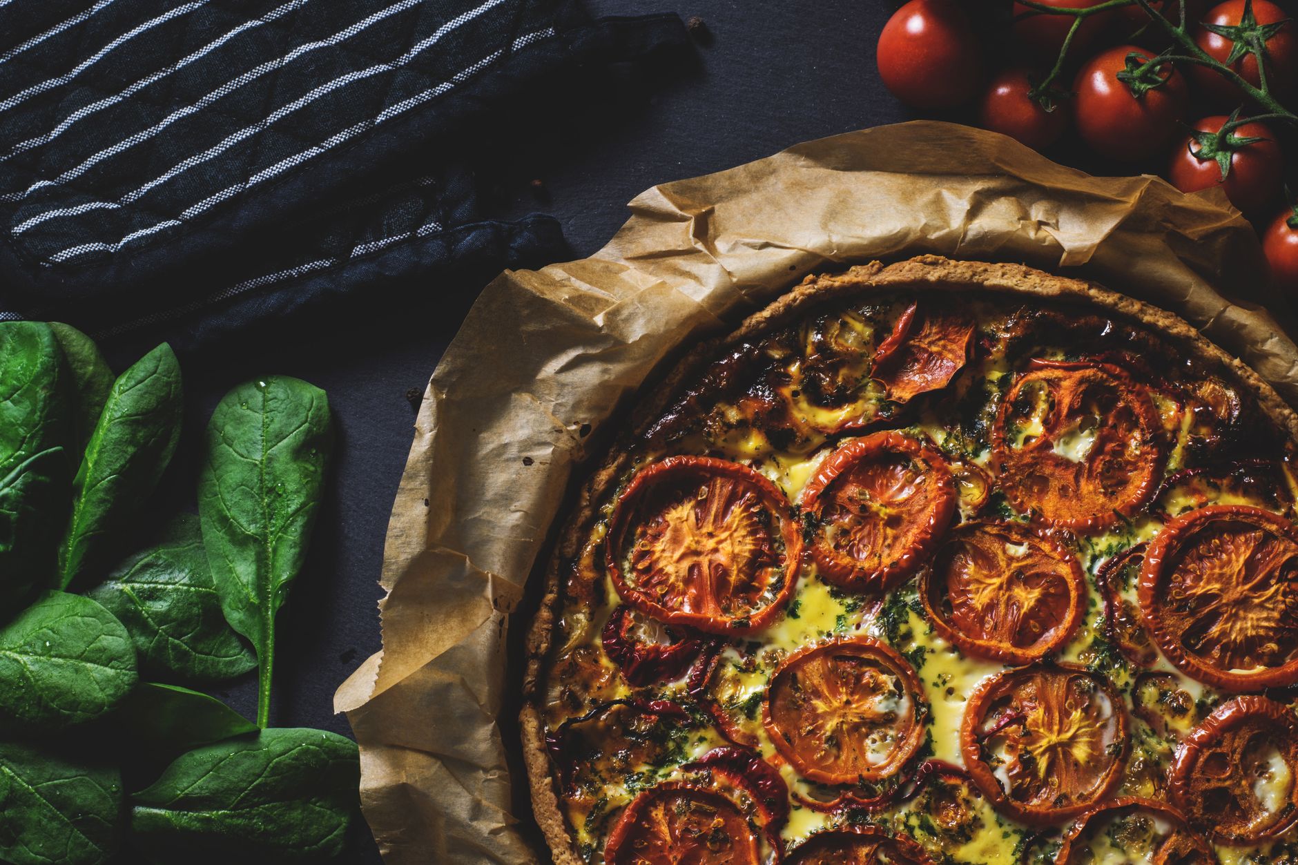 Delicious rustic quiche topped with tomatoes, ideal for a healthy and tasty meal. — Papa Johns Still Has Some of the Best Lun