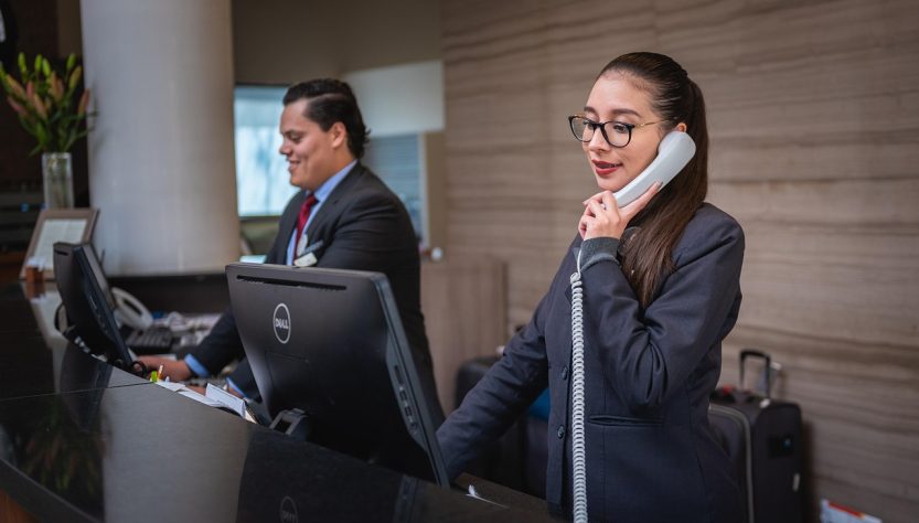 Receptionists, phone call, hotel — The Future of Cannabis Shopping: Canadian Online Dispensaries Explained