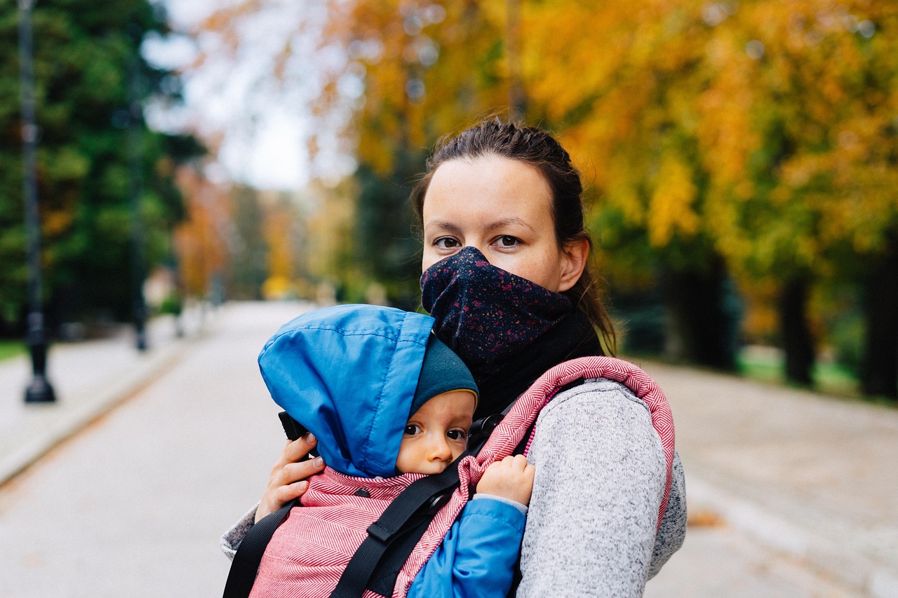 Woman, child, face mask — The Organic Mattress Topper Just the Way You Need