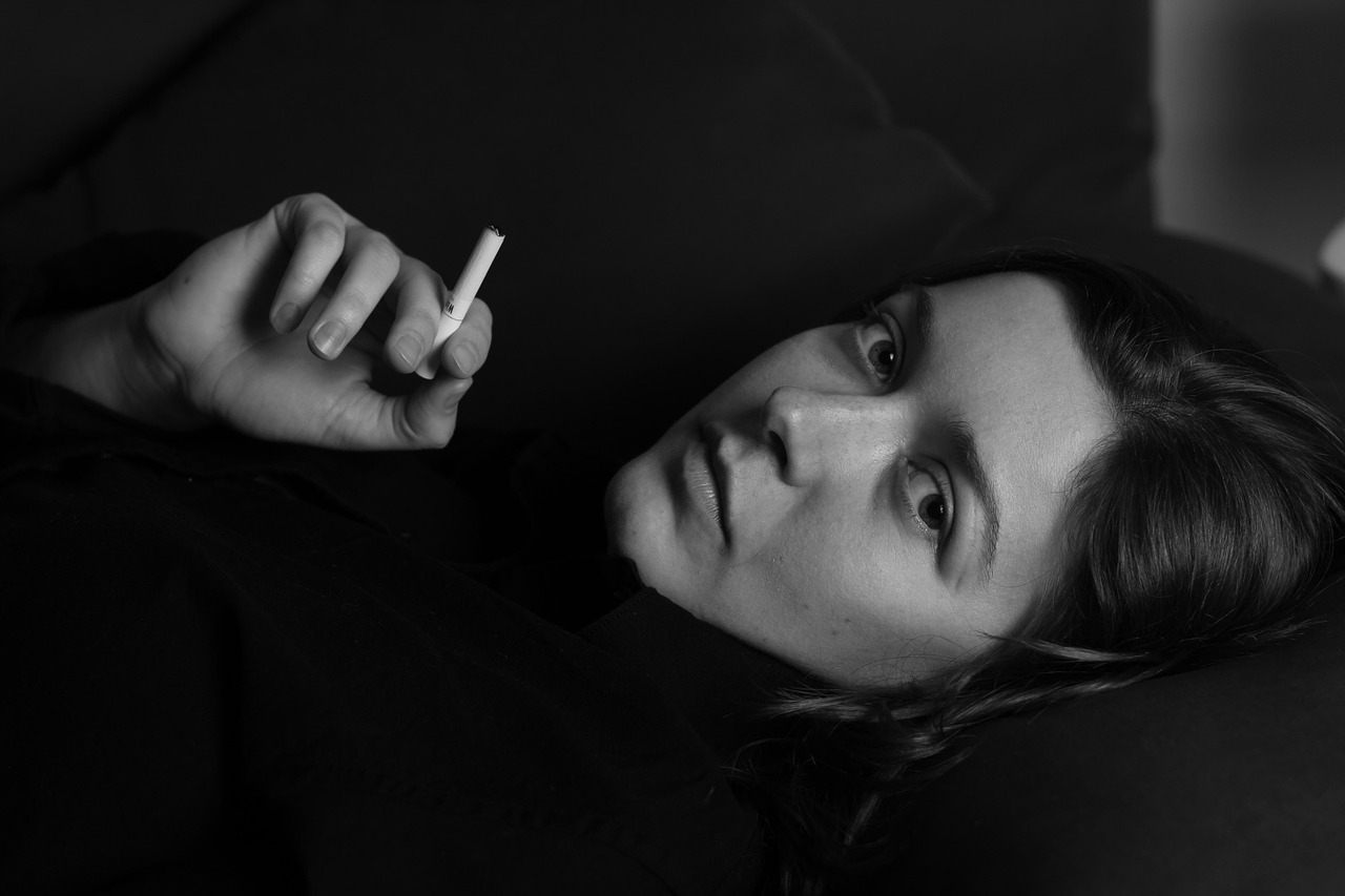 Woman, cigarette, smoking — When Should a Child Get Braces? Key Signs You Should Be Looking for